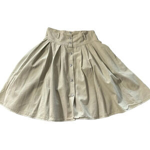 Airport women's pleated tan twirly skirt size 7